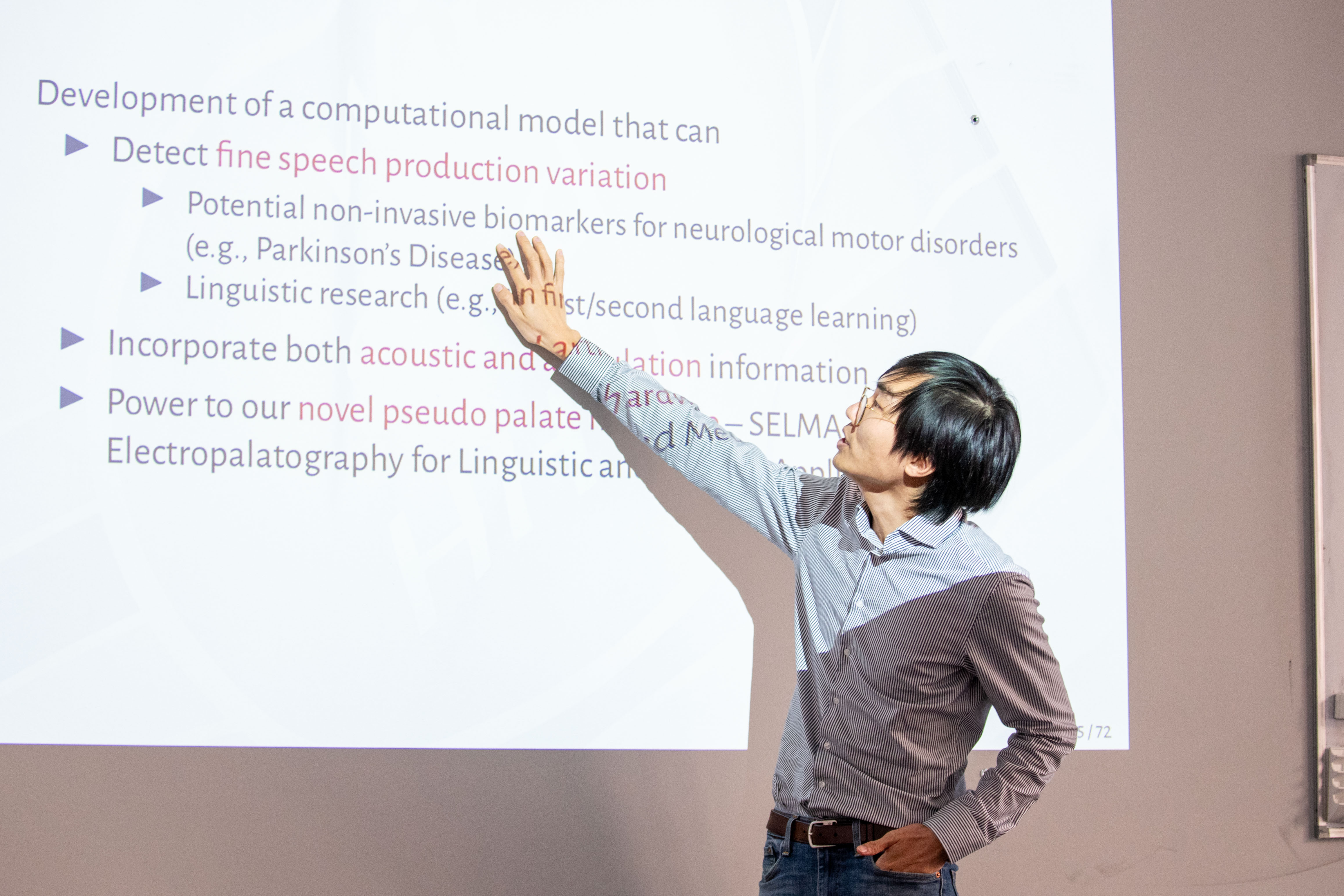 Kevin Tang explaining approaches to computational model development.